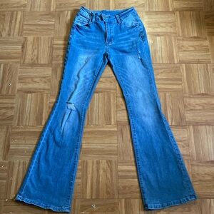 light wash mid-rise flare jeans (distressed)